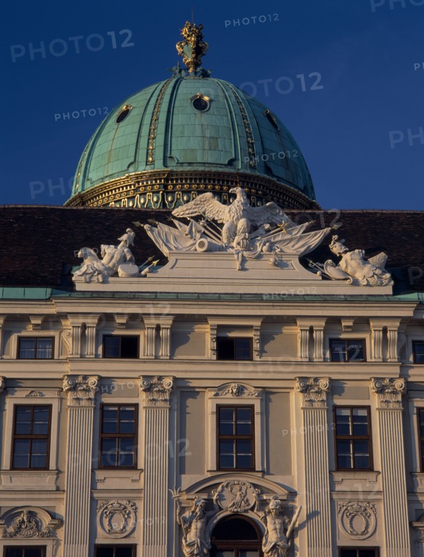 AUSTRIA, Vienna, Hofburg Royal Palace. St Michael Gate facade detail and green dome seen from In der Burg Courtyard