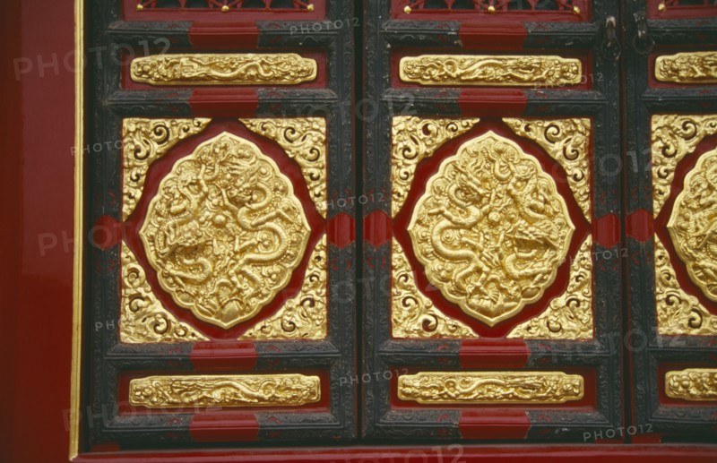 CHINA, Hebei, Beijing, "The Forbidden City.  Detail of red, black and gold decoration."