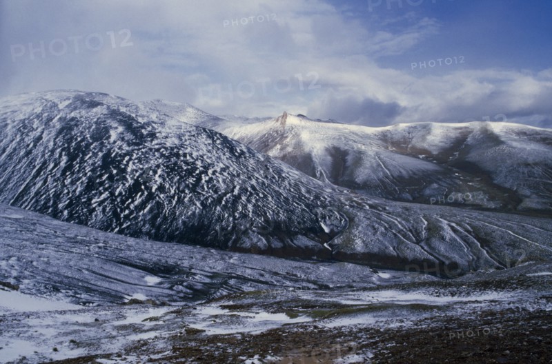 TIBET, Landscape, Mountain landscape in light covering of snow.