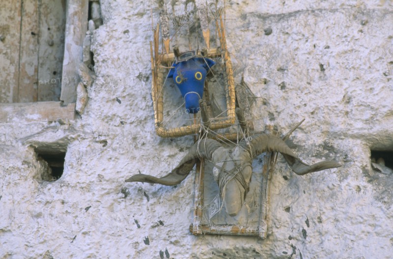 NEPAL, Mustang, Effigies fixed above the main entrance of a home to ward off evil spirits.