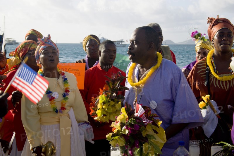 WEST INDIES, St Vincent & The Grenadines, Union Island, Preacher and Baptist congregation in Clifton at Easter morning harbourside service for those lost at sea