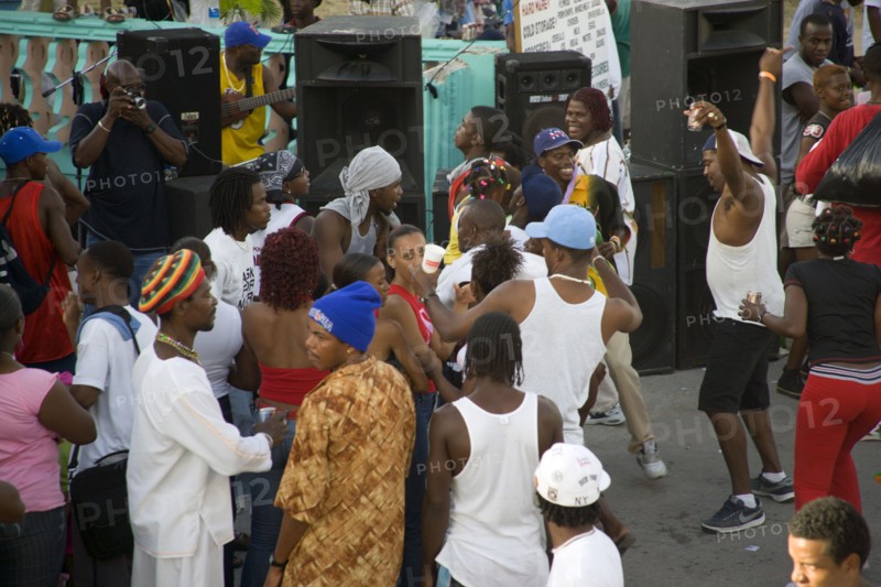 WEST INDIES, St Vincent & The Grenadines, Union Island, People dancing beside sound system at Easterval Easter Carnival in Clifton
