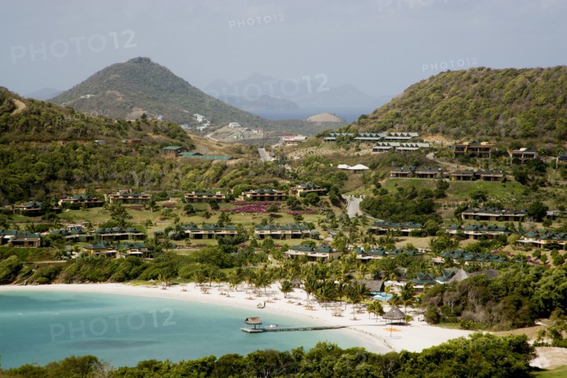 WEST INDIES, St Vincent & The Grenadines, Canouan, Jambu Beach at Raffles Resort with Union Island in the distance