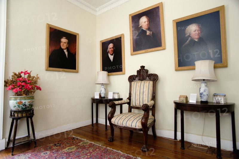 WEST INDIES, Barbados, St Peter, Interior of the Jacobean plantation house of St Nicholas Abbey showing oil paintings of past owners