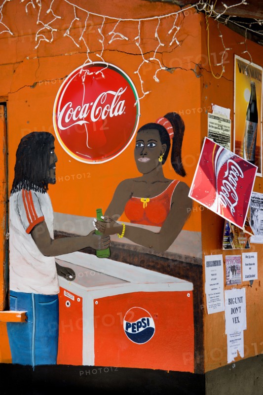 WEST INDIES, St Vincent & The Grenadines, Bequia, Wall painting on a bar depicting woman selling drinks to a man from an ice cooler