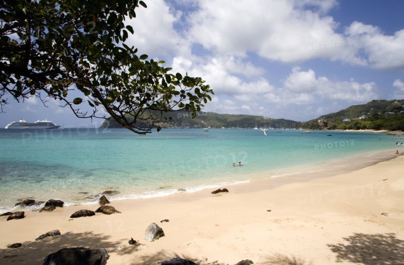 WEST INDIES, St Vincent & The Grenadines, Bequia, Lower Bay beach with cruise ship moored offshore