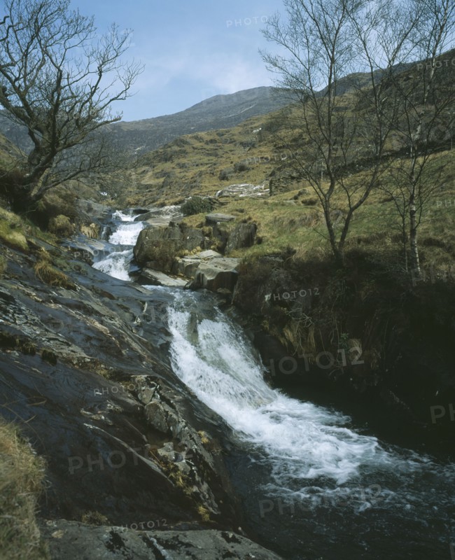 WALES, Snowdonia, Cwm y Llan Waterfall, Waterfall cascading over rocks in stream flowing south east from Snowdon to Nant Gwynant