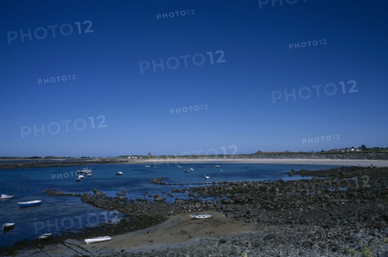 UNITED KINGDOM, Channel Islands, Guernsey, St Saviours. Perelle Bay rocky shoreline.