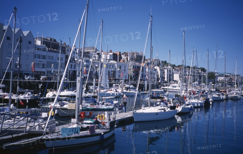 UNITED KINGDOM, Channel Islands, Guernsey, St Peter Port. Victoria Marina yachts and quayside buildings.