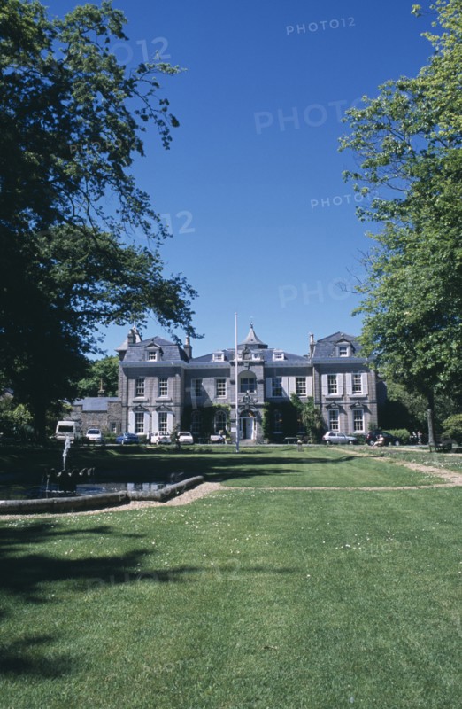 UNITED KINGDOM, Channel Islands, Guernsey, St Martins. Saumarez House. View of front entrance from green lawn.