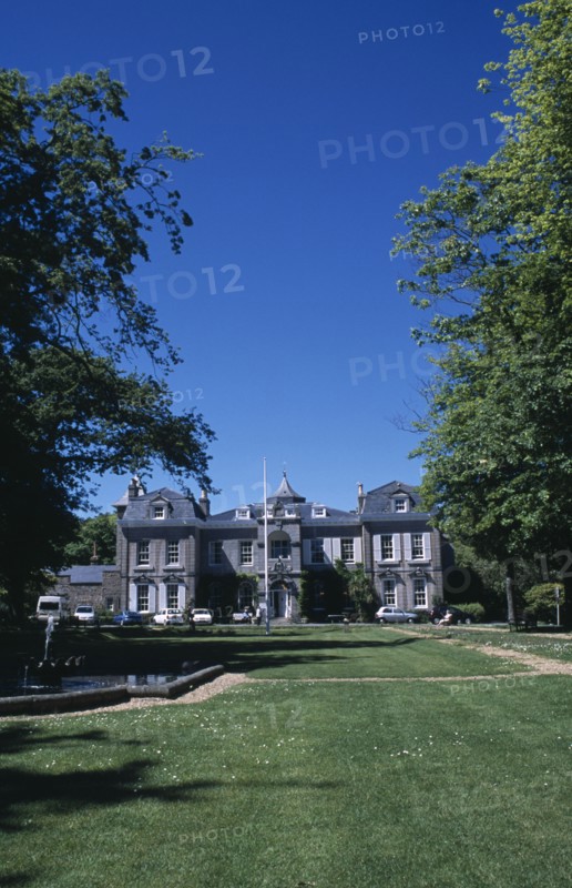 UNITED KINGDOM, Channel Islands, Guernsey, St Martins. Saumarez House. View of front entrance from green lawn.