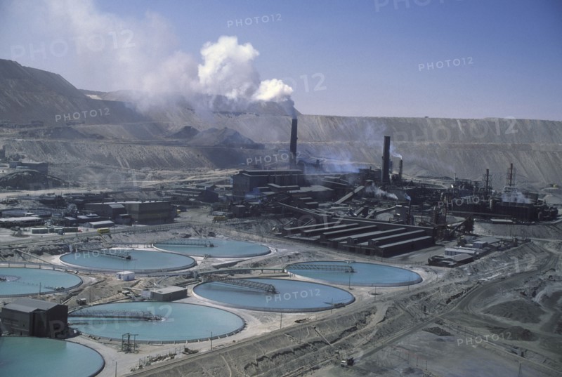CHILE, Antofagasta, Chuquicamata, Copper Mine with smoke coming out of  stacks in the distance.