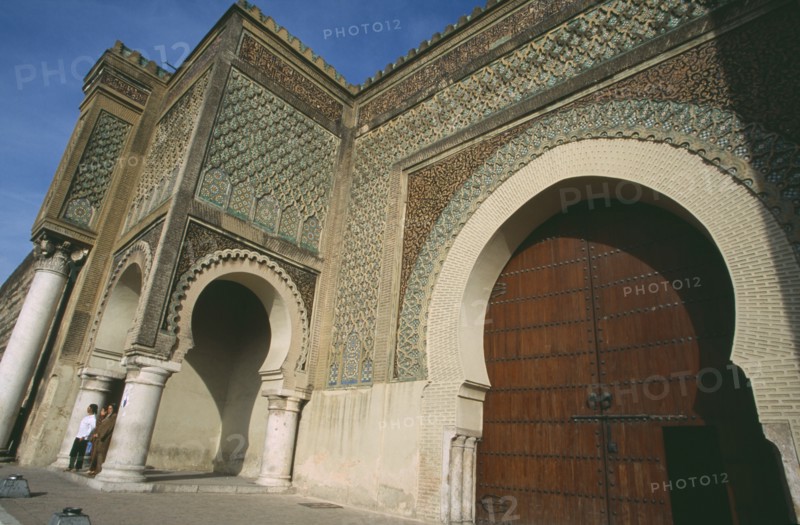 MOROCCO, Meknes, Bab Mansour.  Gateway at entrance to the seventeenth century imperial city of Moulay Ismail decorated with zellij tiles and inscriptions.