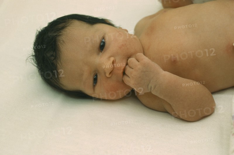 CHILDREN, Babies, New Born, "One day old Caucasian baby with thick, dark hair."