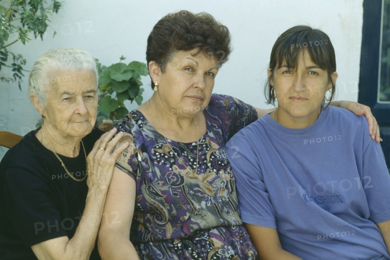SPAIN, Andalucia, "Portrait of grandmother, daughter and grand-daughter.  Three generations."