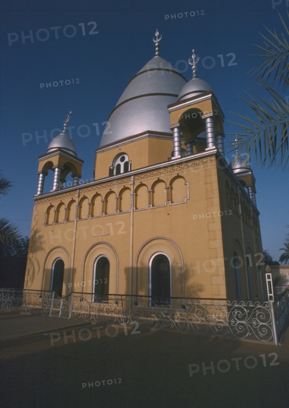 SUDAN, Omdurman, "Tomb of the Madhi, Muhammad Ahmad ibn as Sayyid Abd Allah.  Exterior with domed silver roof and decorative wrought iron railings."
