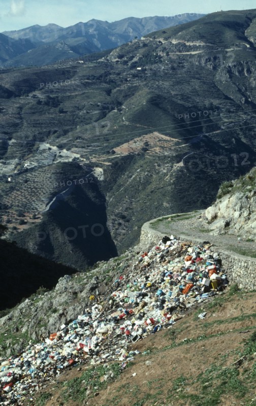 SPAIN, Andalucia, Environment, Rubbish dump on mountainside.