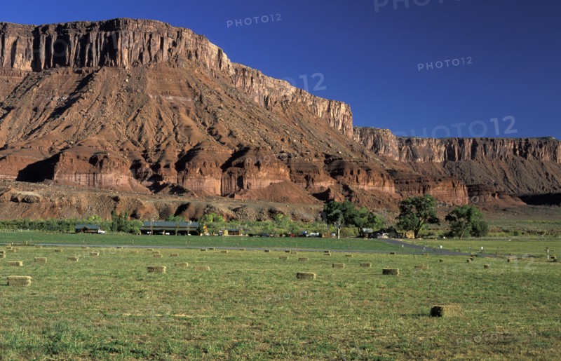 USA, Utah, Colorado River, Irrigated ranch by the Colorado River adds green to this otherwise arid landscape of sandstone canyons north east of Moab.