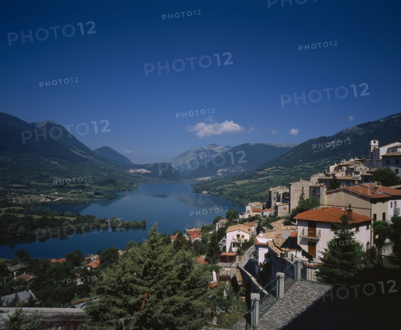 ITALY, Abruzzo, Barrea, "The village perched on the side of the mountain. Lago di Barrea, lake."