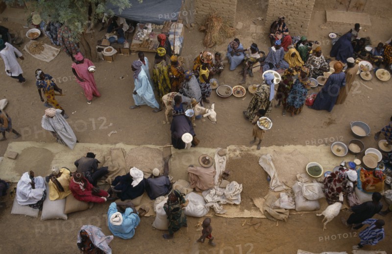 MALI, Sahel Desert, Tonka, "Looking down on traders, customers and stalls at busy rural market. "