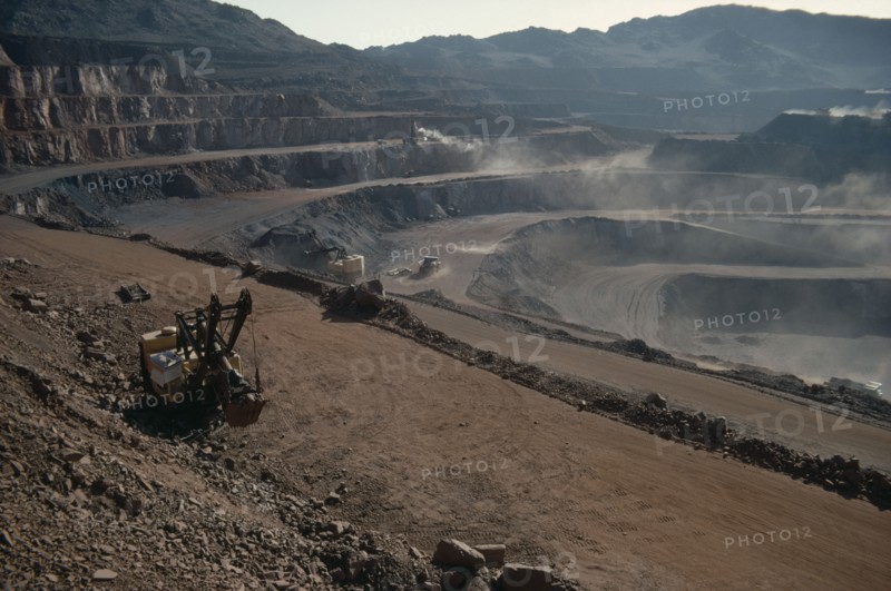MAURITANIA, Zouerate, Iron mine.  Machinery working on terraces.