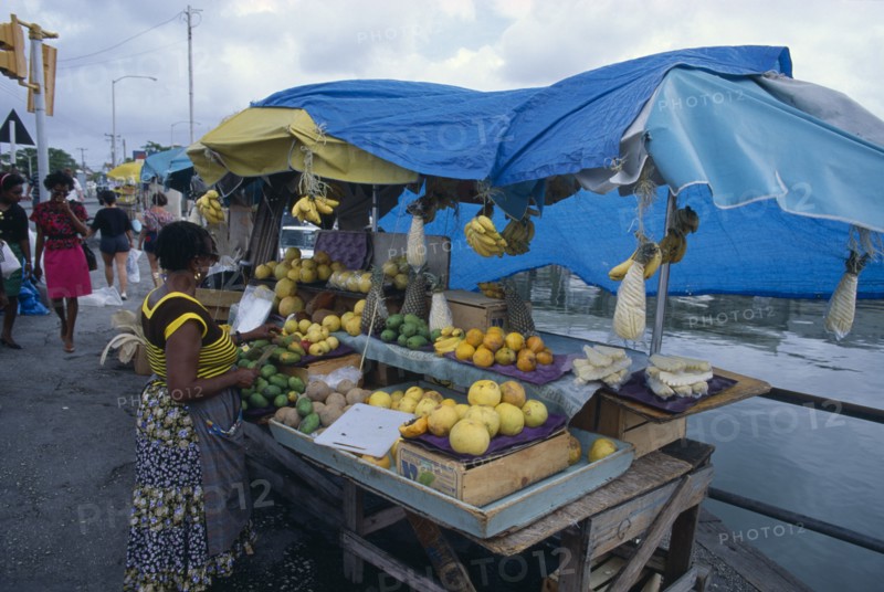 BARBADOS, Bridgetown, Fruit stall beside the Careenage.