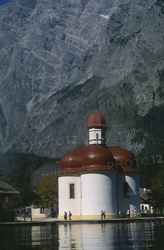 GERMANY, Berchtesgaden, Konigssee, The red wooden tiled baroque church of Saint Bartholoma.