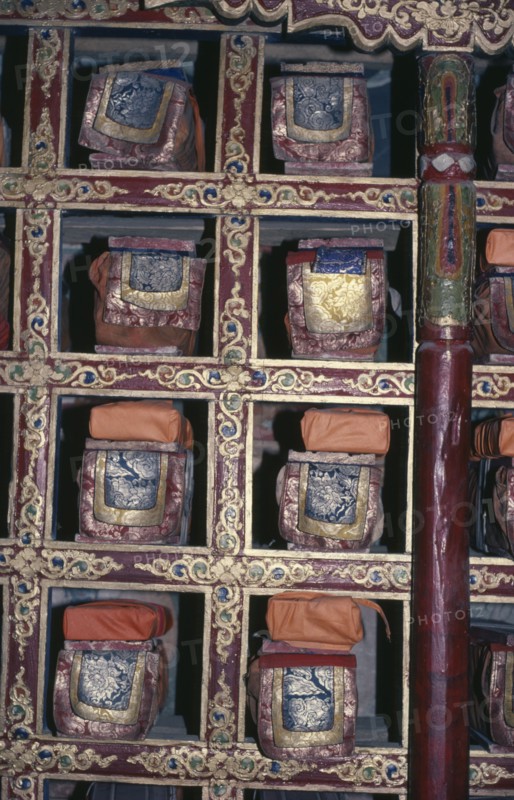 INDIA, Ladakh, Hemis Gompa, Detail of library of texts and scriptures in Buddhist monastery.