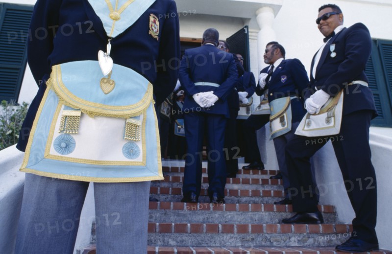BERMUDA, St Georges, Cropped view of freemasons wearing regalia for the Peppercorn ceremony.
