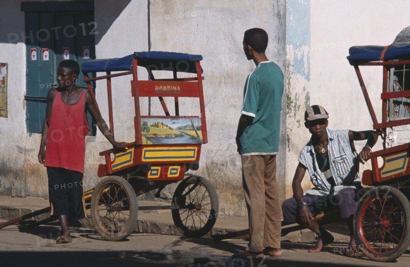 MADAGASCAR, Ambalavao, Rickshaw drivers and their vehicles
