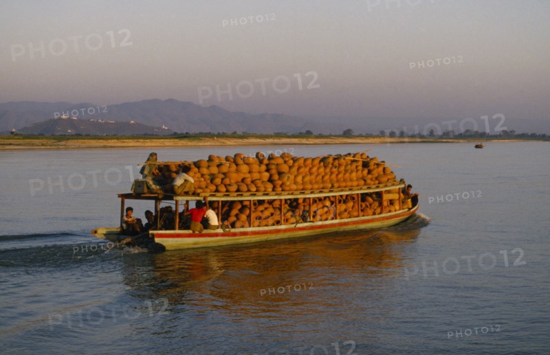 MYANMAR, Transport, Boat full of clay pots on the Irrawaddy River between Mandalay and Mingun.