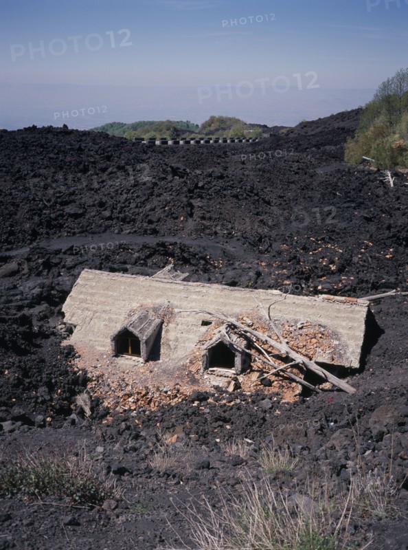 ITALY, Sicily, Mount Etna, A house destroyed by lava flow .