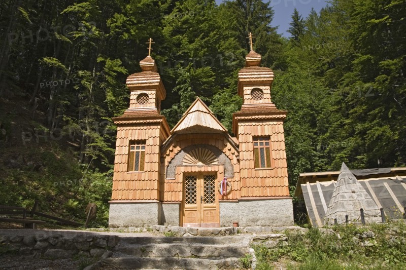 SLOVENIA , Triglav National Park, Julian Mountain Range, Ruska Kapelica The Russian Chapel 1915 -17 - the pyramid on the right is a memorial to 100 Russian Prisoners of War killed in an avalanche whilst building the road through the Julian Alps