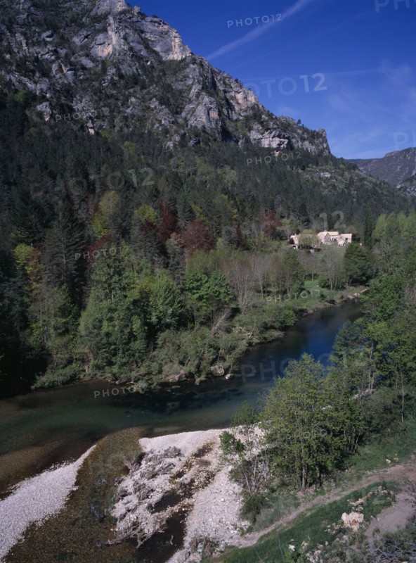 FRANCE, Midi Pyrenees, Tarn Gorge, "View along the gorge to the restored Hamlet, small village, West of  La Malene."