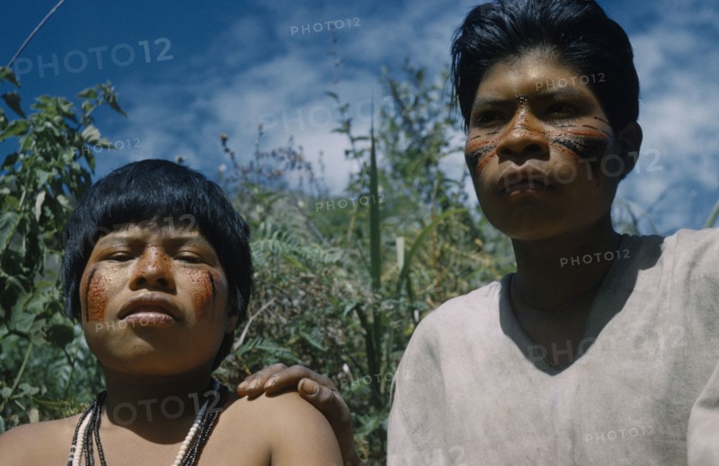COLOMBIA, Sierra de Perija, Yuko - Motilon , Gabriel and wife with red “Achiote” and black fungal facial paint