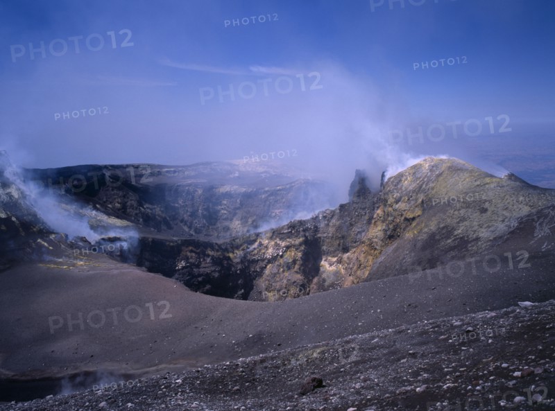 ITALY, Sicily, Mount Etna, Sulphur coated edge of the smoking summit crater