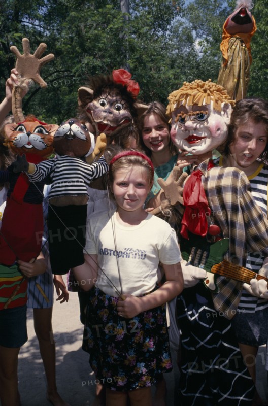 RUSSIA , Children, Kids with puppets at summer camp. The camp is a former prison.