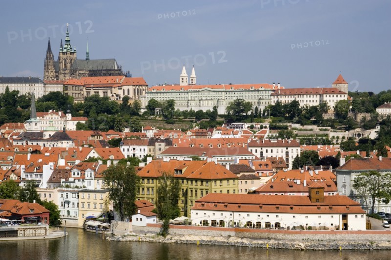 CZECH REPUBLIC, Bohemia, Prague, View across the Vltava River to the Little Quarter overlooked by Prague Castle and St Vitus Cathedral in Hradcany