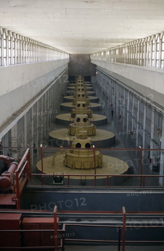 TAJIKISTAN, Nurek, Nine large turbines inside the hydroelectric power station.