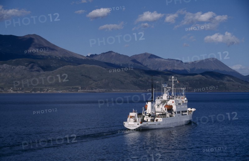ARGENTINA, Tierra del Fuego, Ushuaia, Beagle Channel. Russian cruise ship called Multanovskiy departing from port of Ushuaia
