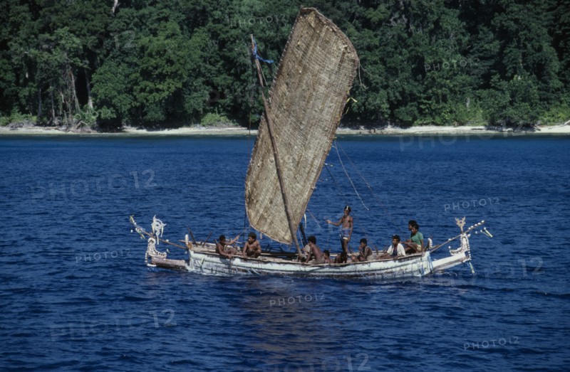 PACIFIC ISLANDS, Melanesia, Papua New Guinea, Marshall Bennett Islands.Gawa Island. Local outrigger boat