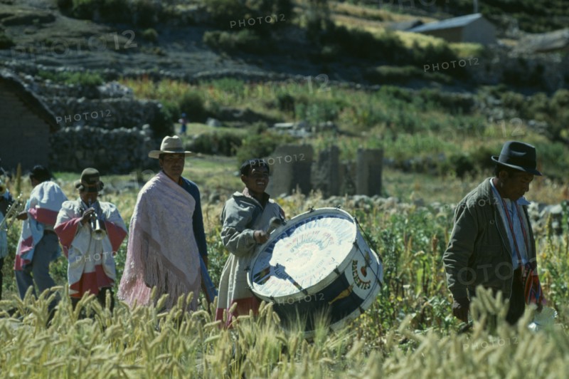 BOLIVIA, La Paz, Lake Titicaca, Musicians taking part in Harvest Festival on Island of Sun.