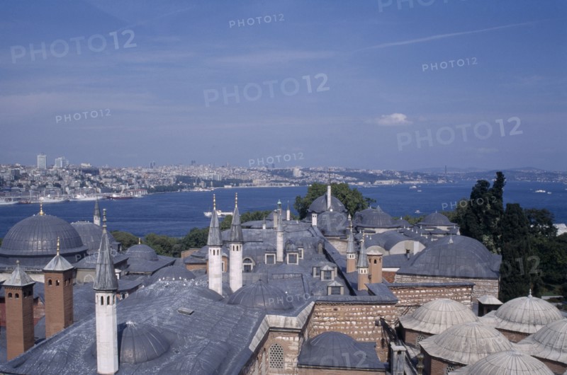 TURKEY, Istanbul, Topkapi Palace.  View across rooftops of the Harem to the Bosphorous.
