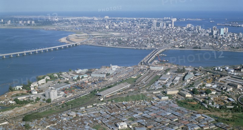 NIGERIA, Lagos, Aerial view of the city and road bridges.