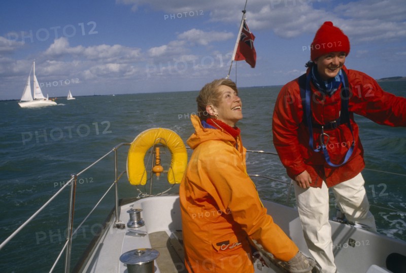 ENGLAND, Dorset, Lymington, Female crew on yacht preparing for trans-Atlantic race.