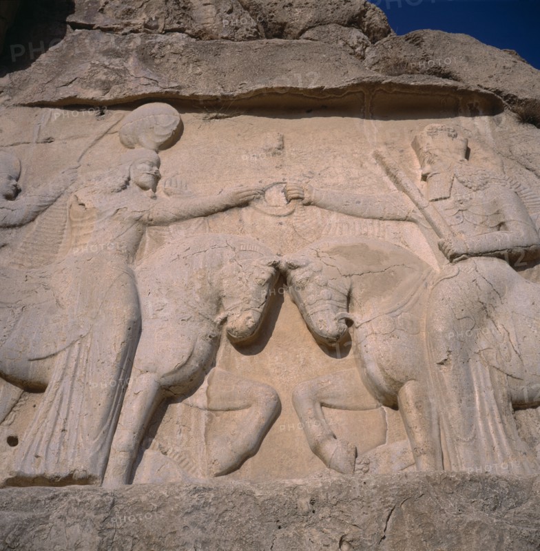 IRAN, Fars Province, Naghshe Rostam, Sassanian relief. Two Stone carved figures on horseback