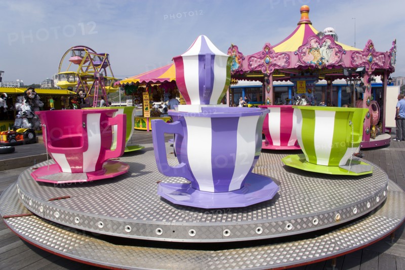 ENGLAND, Dorset, Bournemouth, Funfair ride of teapot and teacups on Bournemouth Pier
