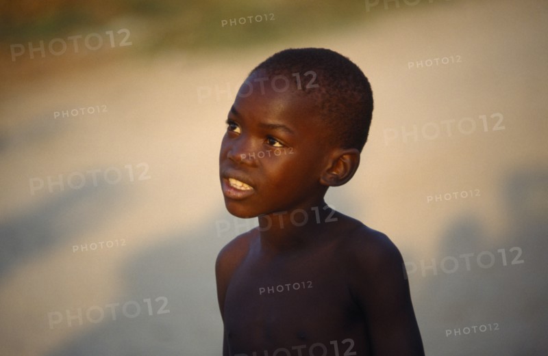 SOUTH AFRICA, Kwa Zula Natal, Matsulu Township. Portrait of young boy