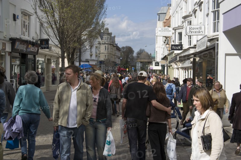 ENGLAND, East Sussex, Brighton, East Street crowded with shoppers.