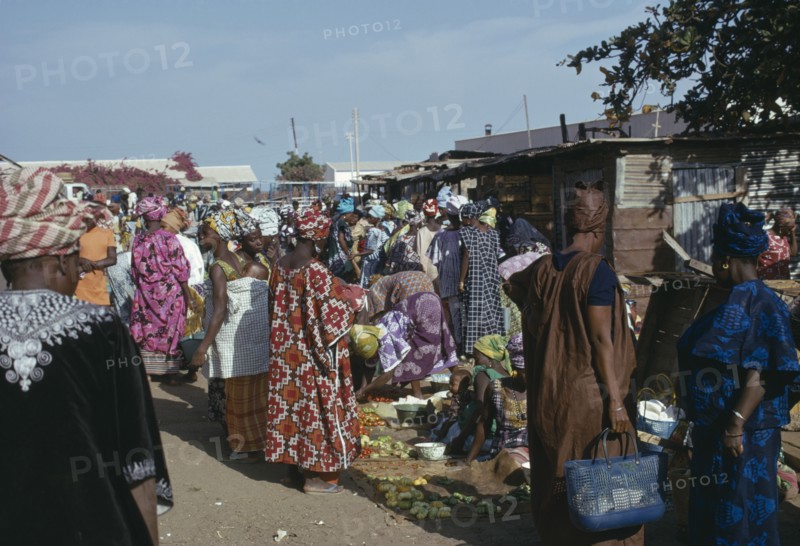 GAMBIA, Banjul, Busy market scene.